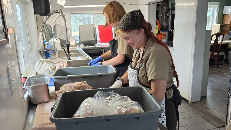 zookeeper students preparing food for the animals at Cat Tales Wildlife Center